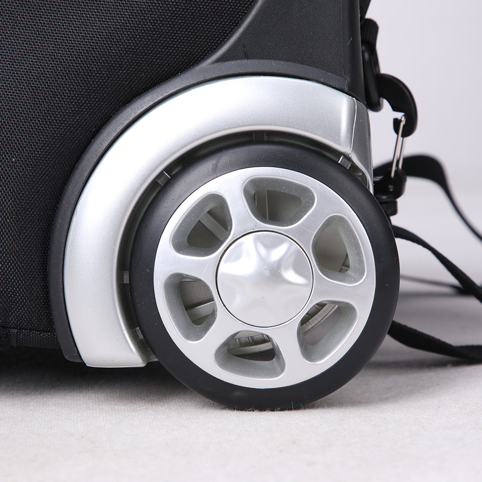 Durable rolling suitcase with large wheels